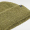 up close of olive boucle beanie hat with cuff