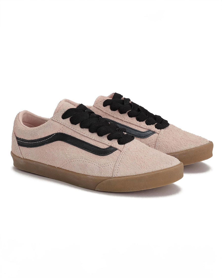 pair of vans peach lowpro sneaker with black faux leather stripe