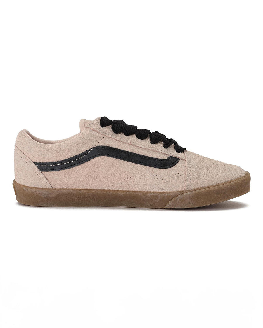 side view of pair of vans peach lowpro sneaker with black faux leather stripe