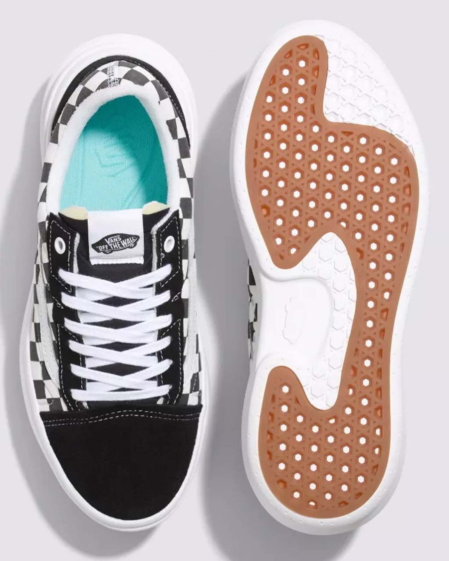 top and bottom view of black and white checkerboard shoes with cushy stackform sole 