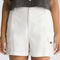 up close of model wearing white 3.5 inch inseam cargo shorts 