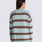 back view of model wearing grey oversized sweater with burgundy and orange stripes