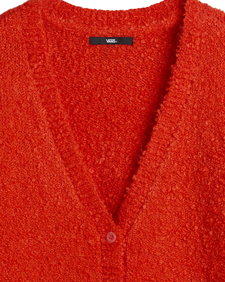 up close of red boucle relaxed fit cardigan