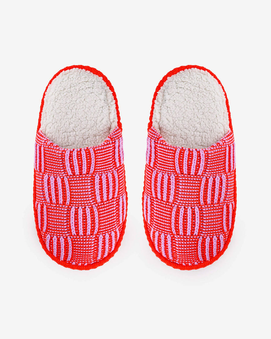 top view of pink checkered slip on slippers with fuzzy interior