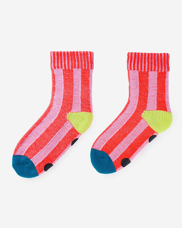 pink striped socks with yellow and blue trim and non-slip bottom