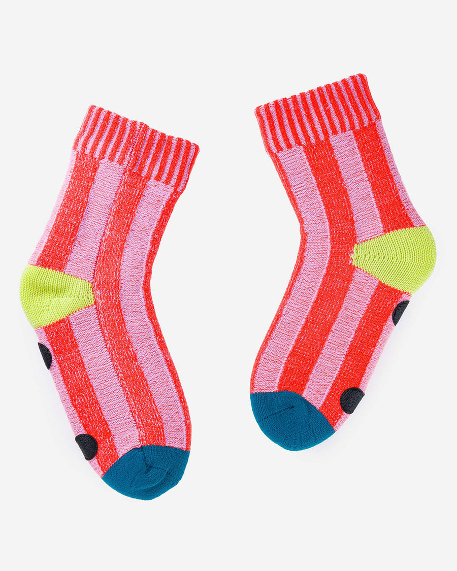 pink striped socks with yellow and blue trim and non-slip bottom