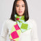 model wearing yellow, pink, blue and green harlequin mini scarf