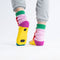 back view of colorful color block house socks