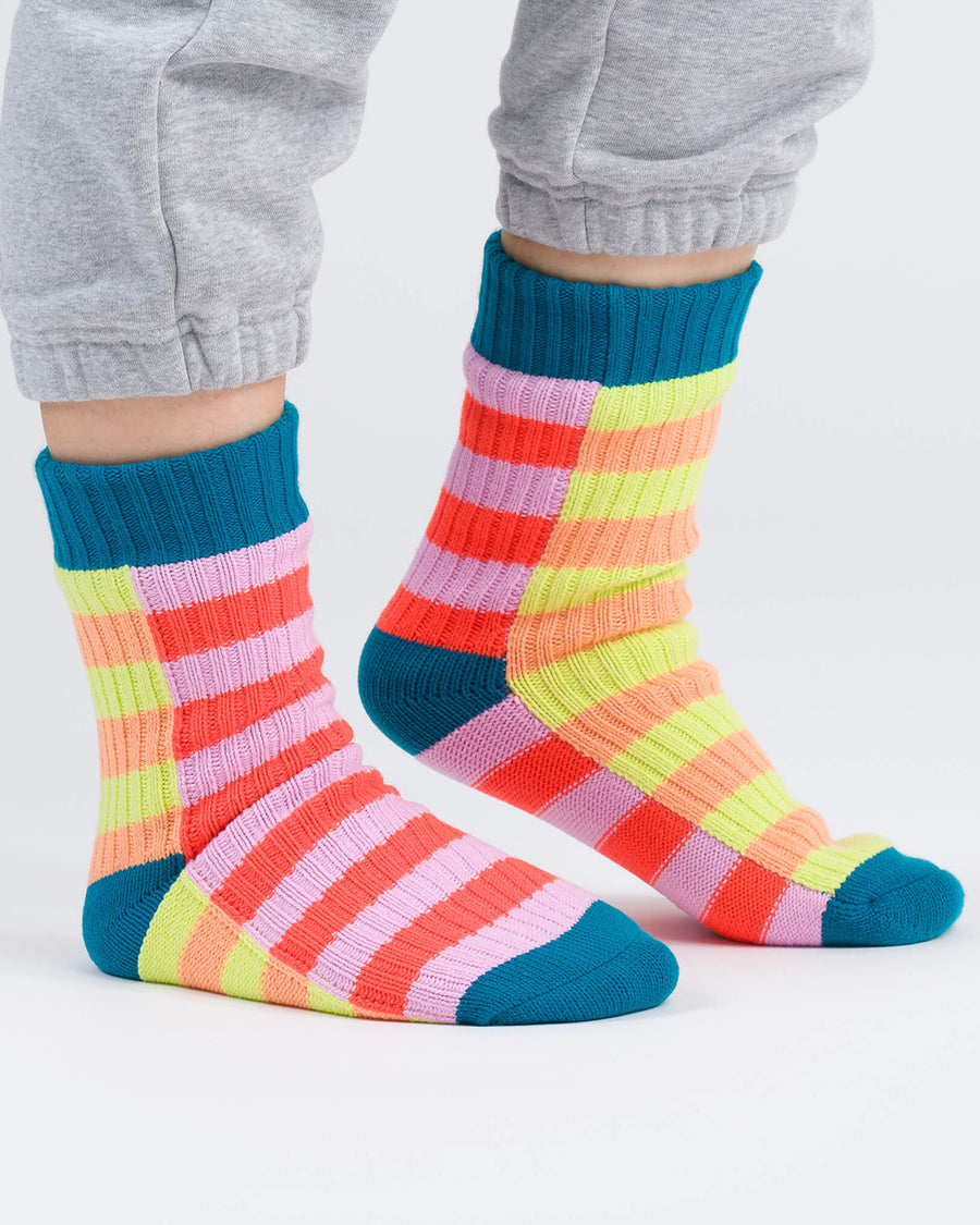 model wearing multicolor stripe ribbed socks