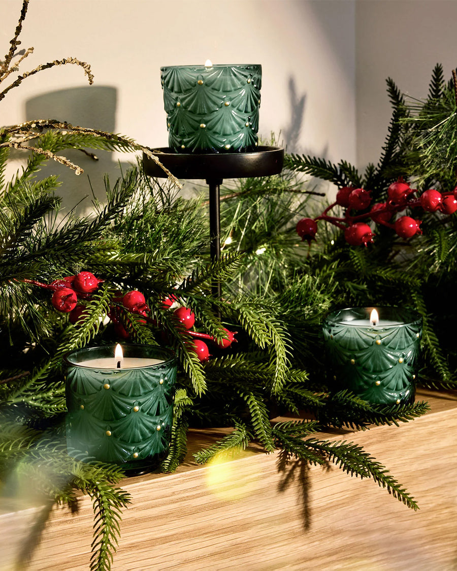 set of 3 noble fir garland 5oz candles on a mantel