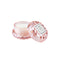 light pink macaron shaped candle in a rose otto scent