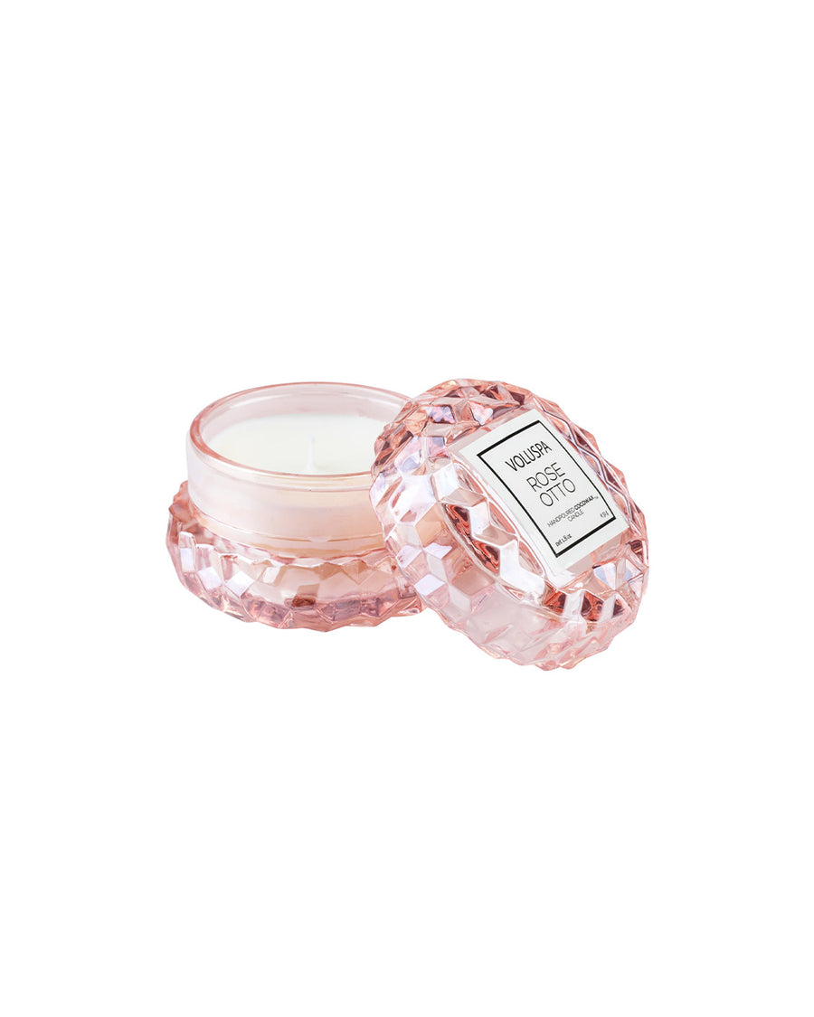 light pink macaron shaped candle in a rose otto scent