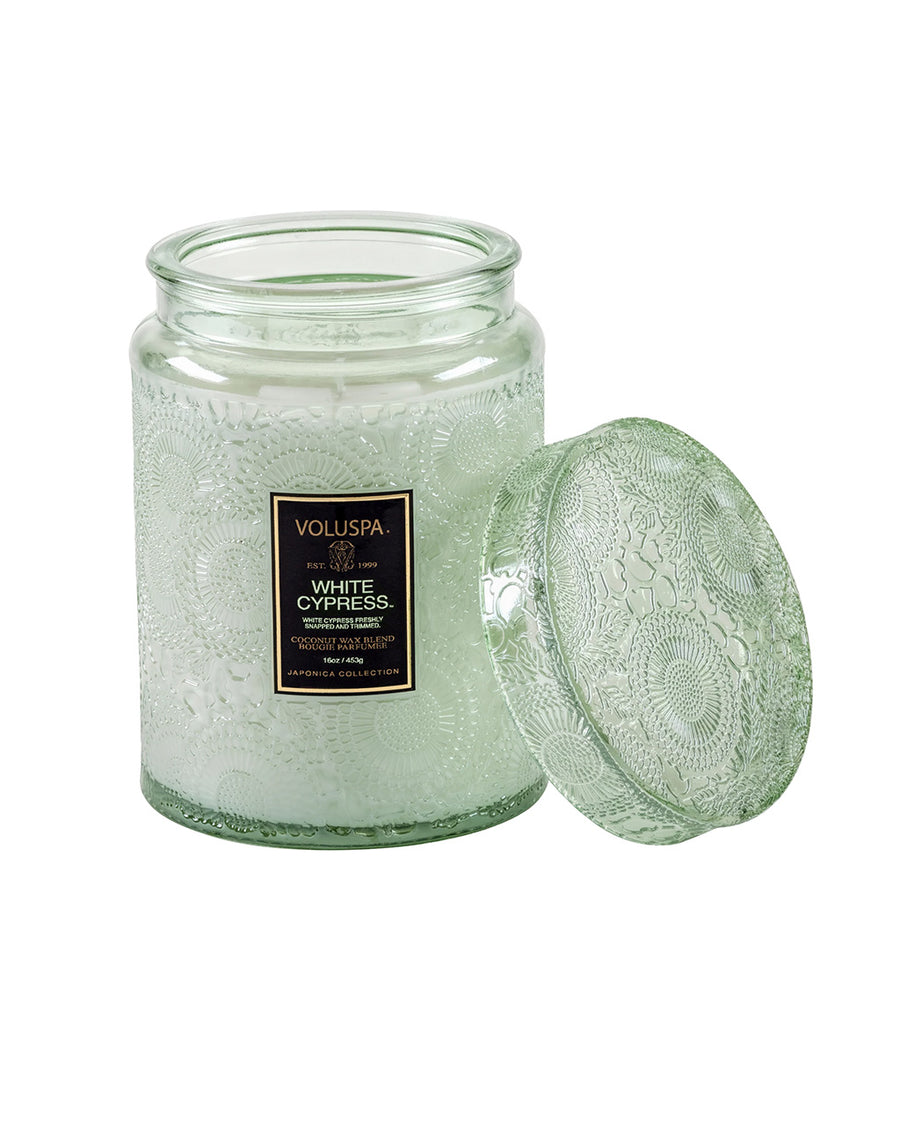 large 18oz. white cypress scented candle in a mint embossed vessel with lid off