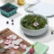 mint ceramic lunch bowl with salad inside