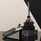 charcoal terrazzo utensil holder with spoon, fork and knife next to a cake