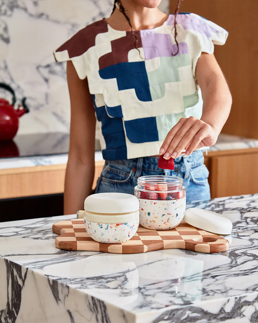 model using 24 oz cream terrazzo seal tight glass bowl with lid