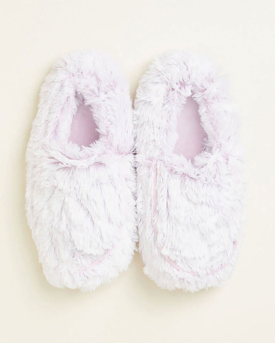 Top view of a pair of fuzzy light lavendar slippers with warmable inserts