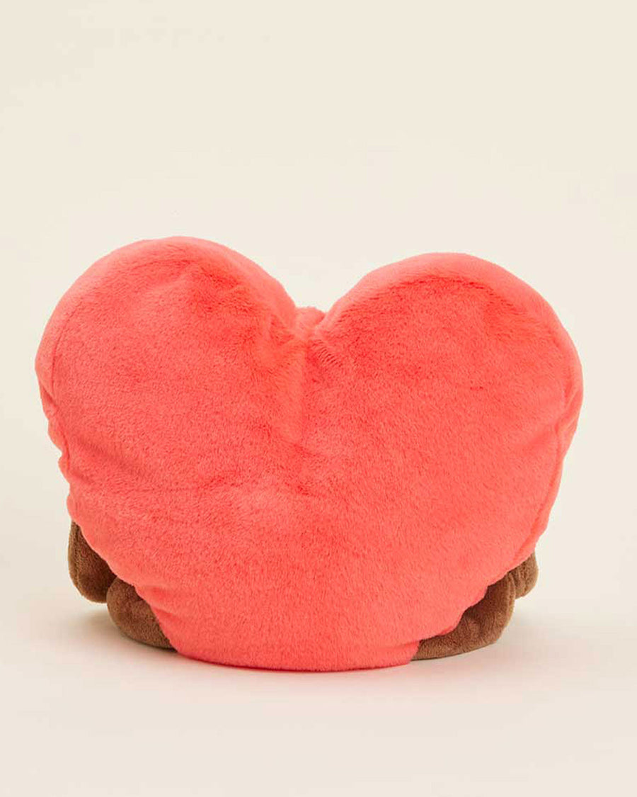 back view of pink heart-shaped plush toy with brown arms and legs