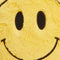 up close of smiley shaped microwavable heating plush