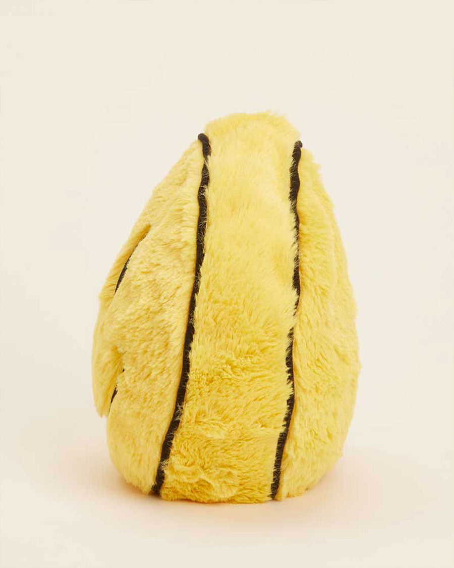 side view of smiley shaped microwavable heating plush