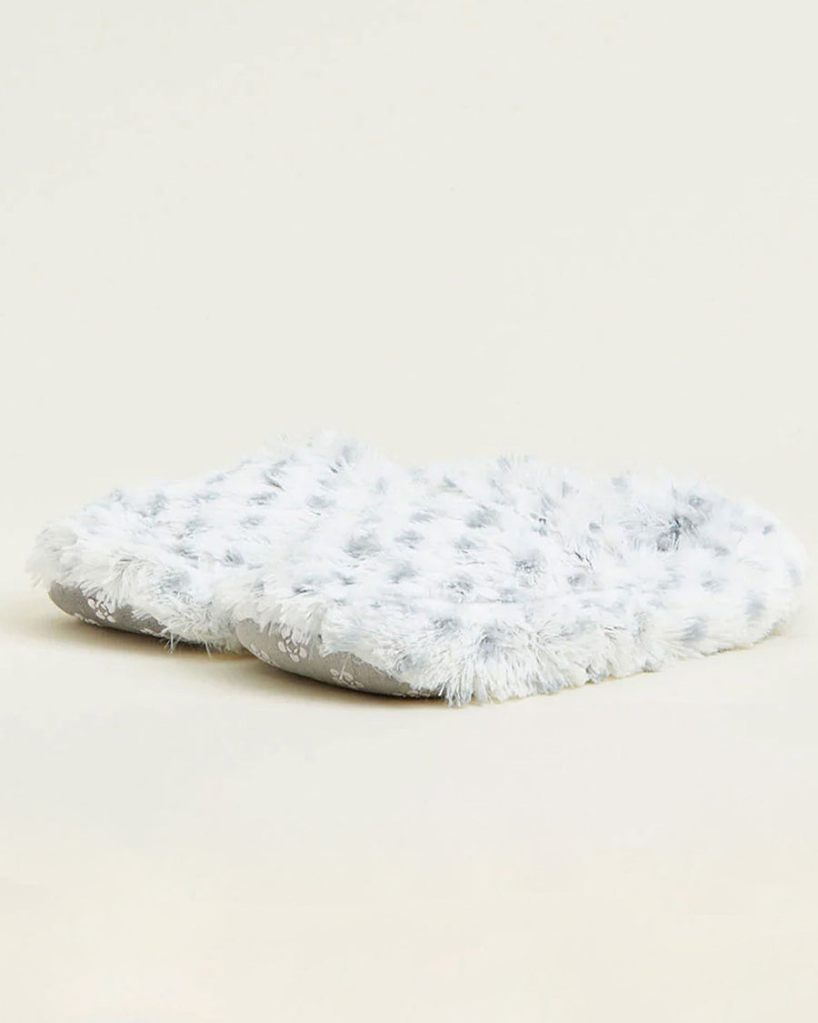 side view of white slippers with grey spots