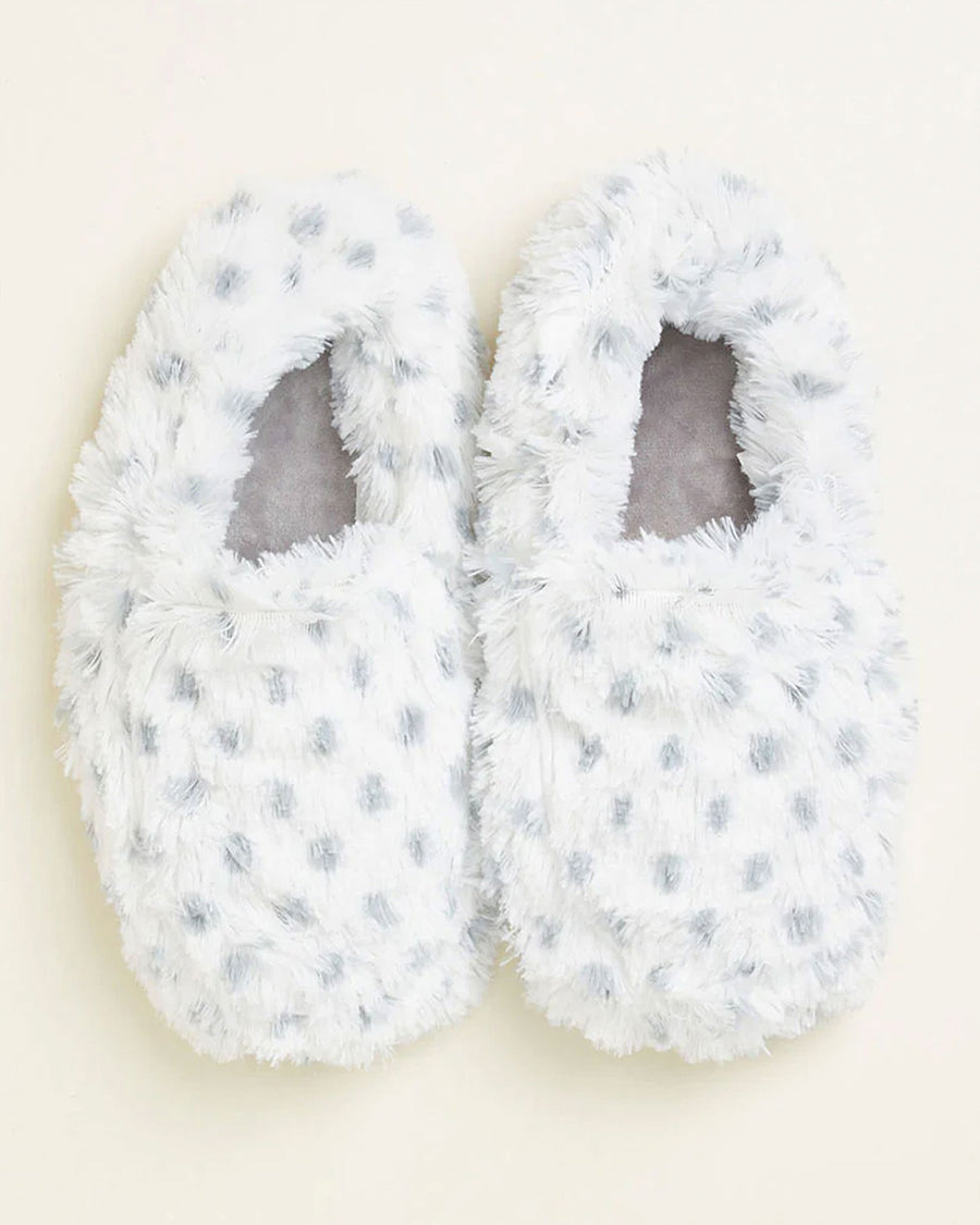 top view of white slippers with grey spots