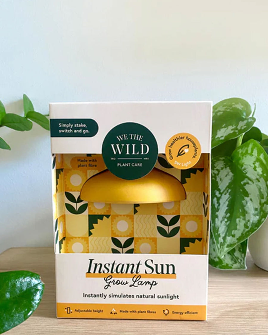 instant sun grow lamp on table