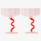 side view of set of two pink and red frosted coupe glasses