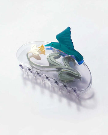 clear hair claw with white flower and hummingbird detail