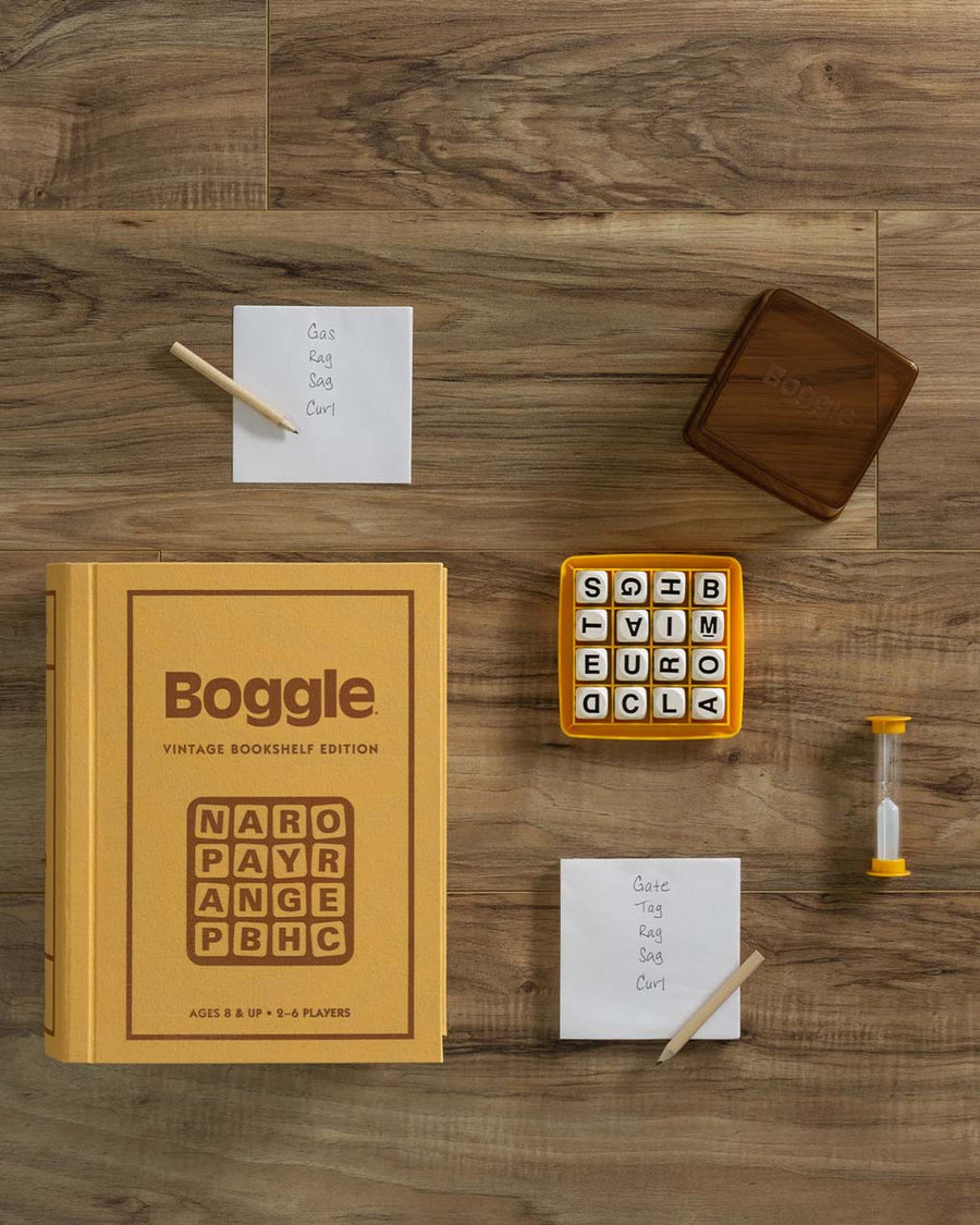 boggle vintage bookshelf edition game with timer, paper, pencil, and boggle letter tray