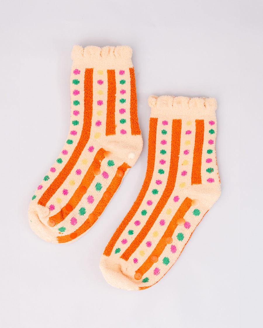 cream chenille socks with ruffle top with orange stripes and multicolor dots