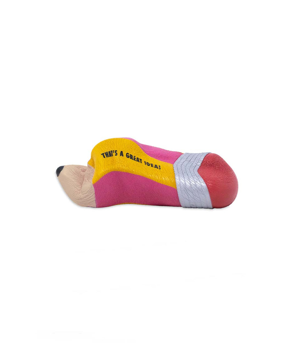 squished yellow and pink pencil shaped de-stress ball