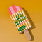 popsicle shaped de-stress ball with yellow and white stripe label that says 'day dream ice cream: tastes like strawberries!' on orange background