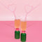 set of two light pink glass heart shaped straws in a pink and green glass set