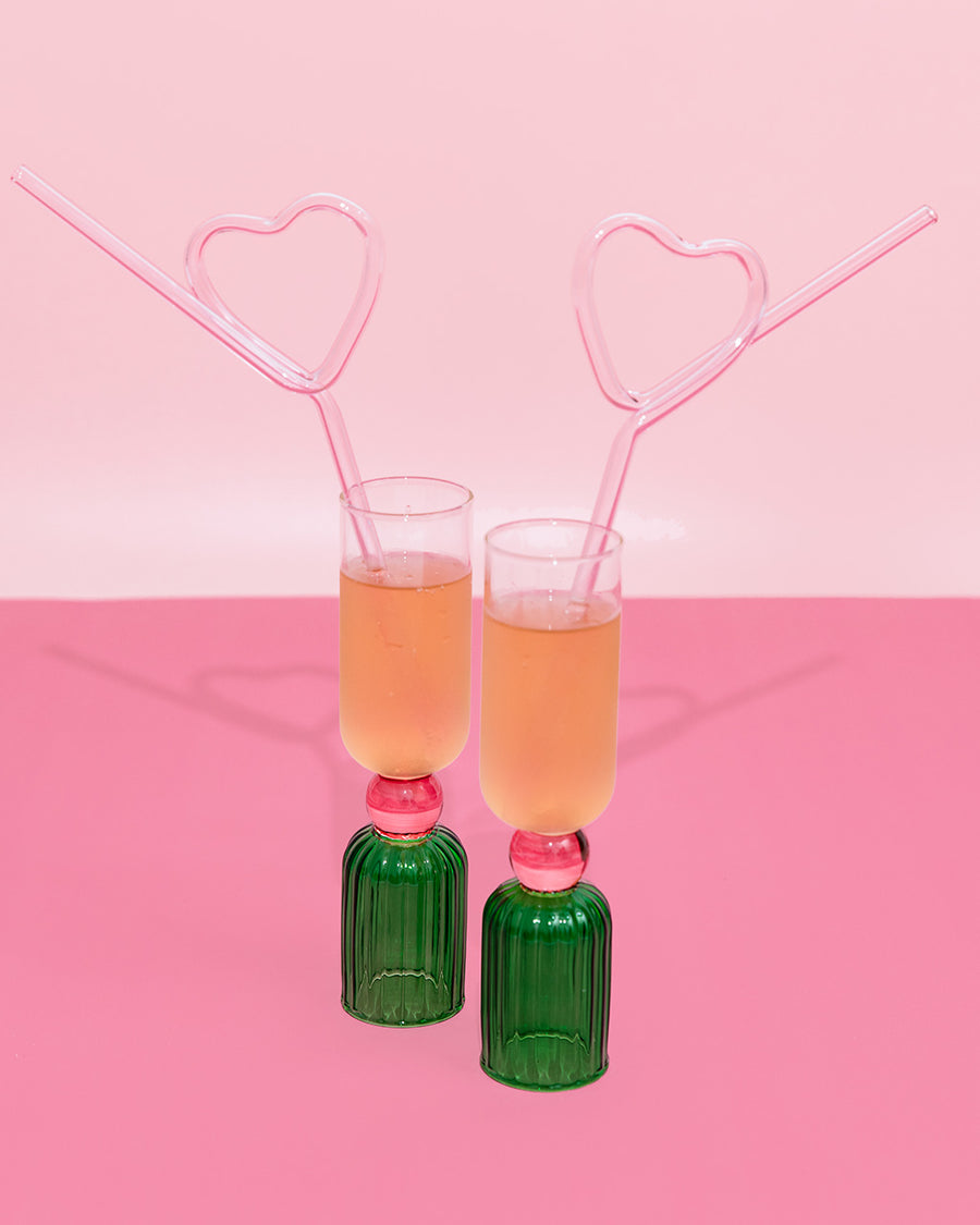 set of two light pink glass heart shaped straws in a pink and green glass set