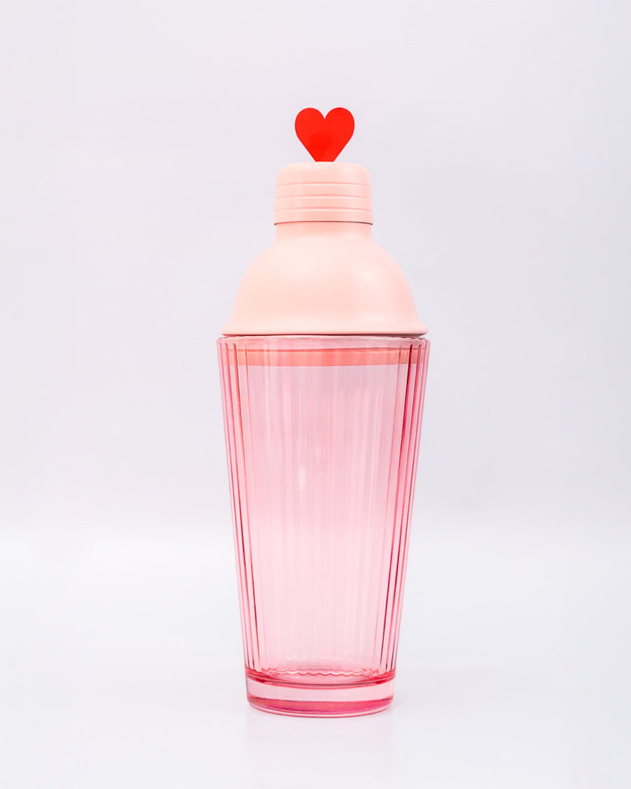 up close of pink bar shaker with red heart on the lid