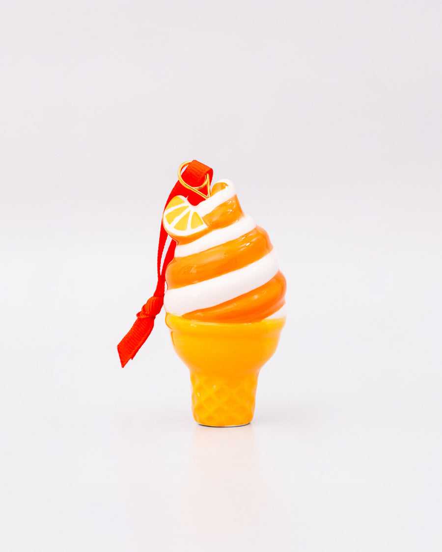 ceramic orange and white swirled ice cream cone ornament