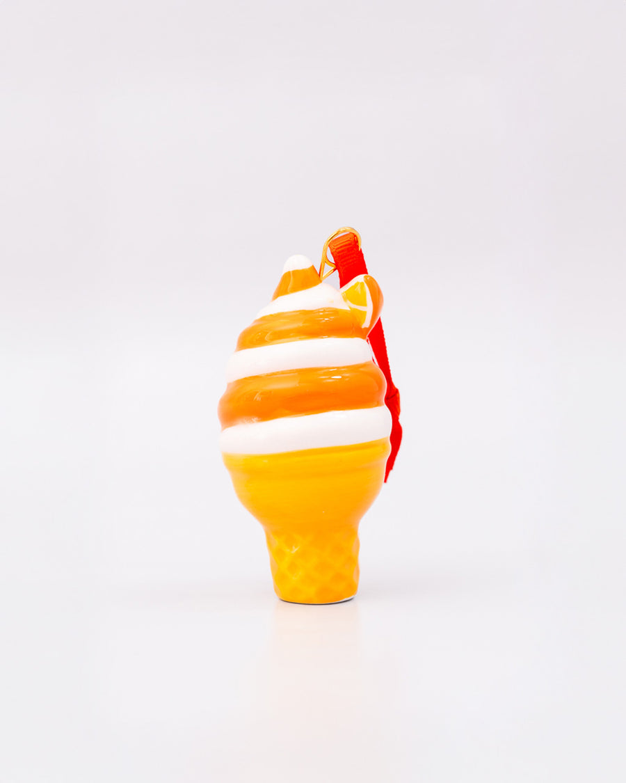 back view of ceramic orange and white swirled ice cream cone ornament