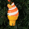 ceramic orange and white swirled ice cream cone ornament on a tree