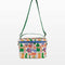 white quilted lunch bag with all over charcuterie print with green and blue trim 