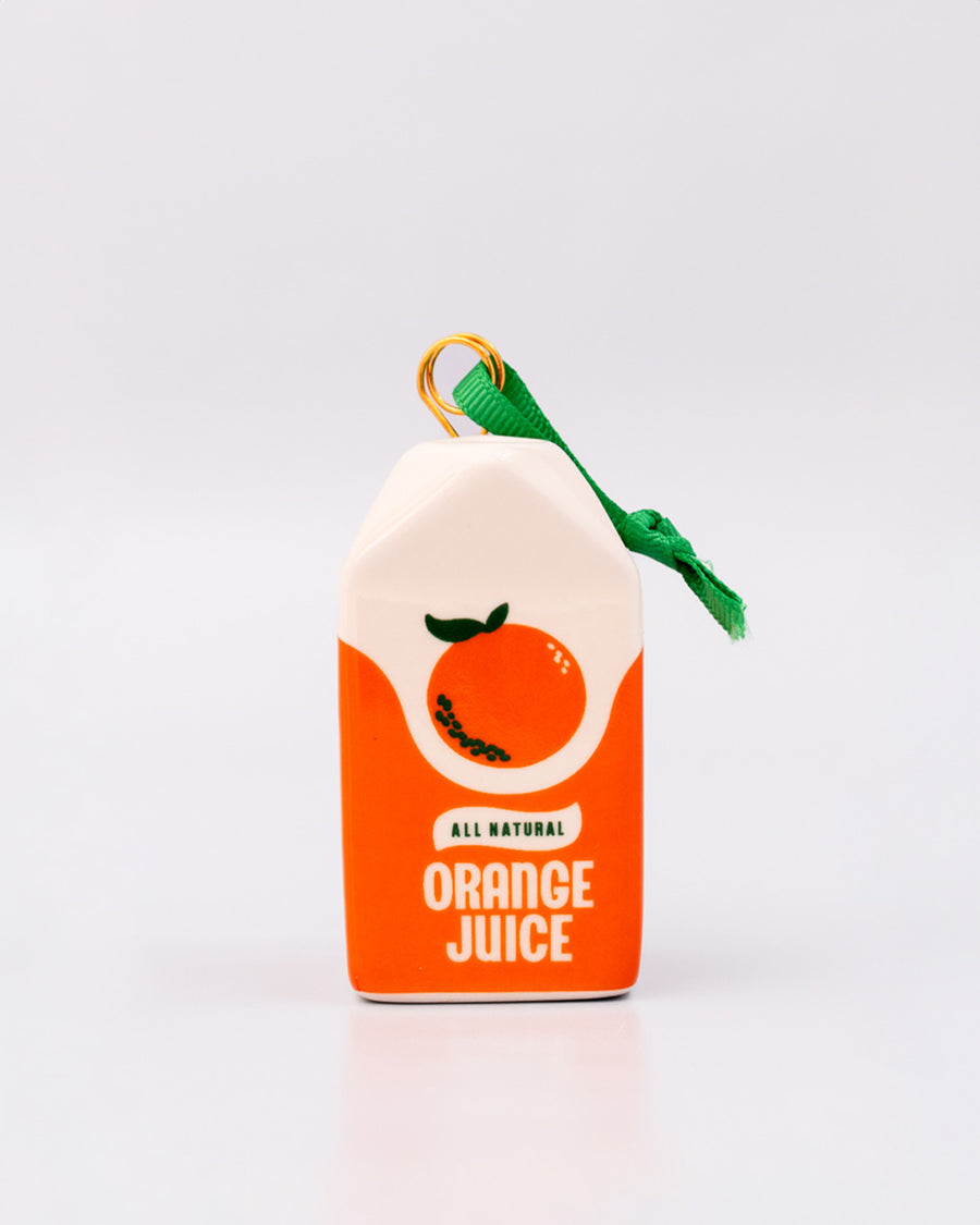 front view of ceramic orange juice shaped ornament