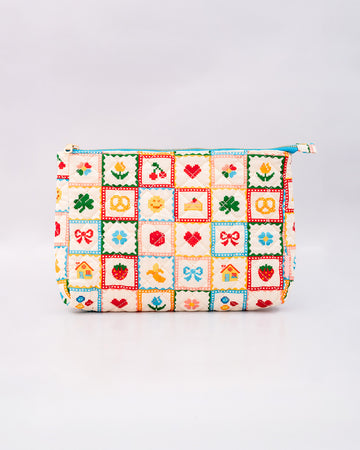 white quilted pouch with various hearts, fruits, smiley faces