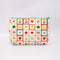 white quilted pouch with various hearts, fruits, smiley faces