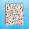 light pink large notebook with cherry and floral print on blue ground