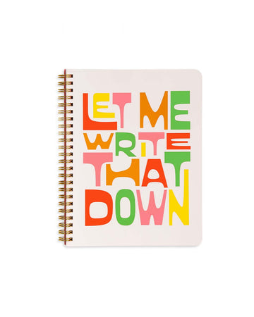 beige mini notebook with colorful 'let me write that down' typography across the front