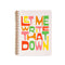 beige mini notebook with colorful 'let me write that down' typography across the front