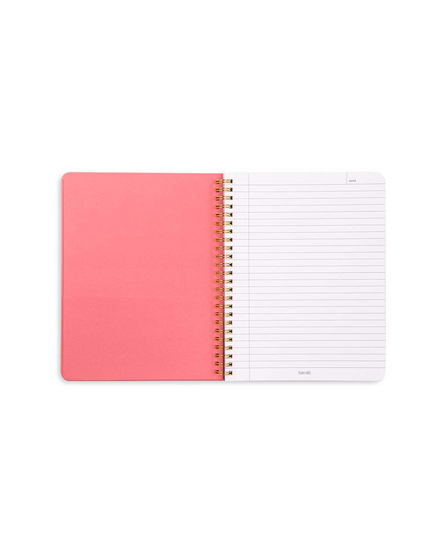 pink pocket and interior pages of mini notebook