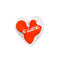 squished red heart shaped de-stress ball with white scalloped trim and white 'je t'aime!' across the front