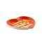 side view of red heart shaped trinket tray that says 'i got smooched at the tunnel of love' in white and metallic gold