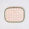 cream mobile tech pouch with red heart quilted pattern with dark green trim